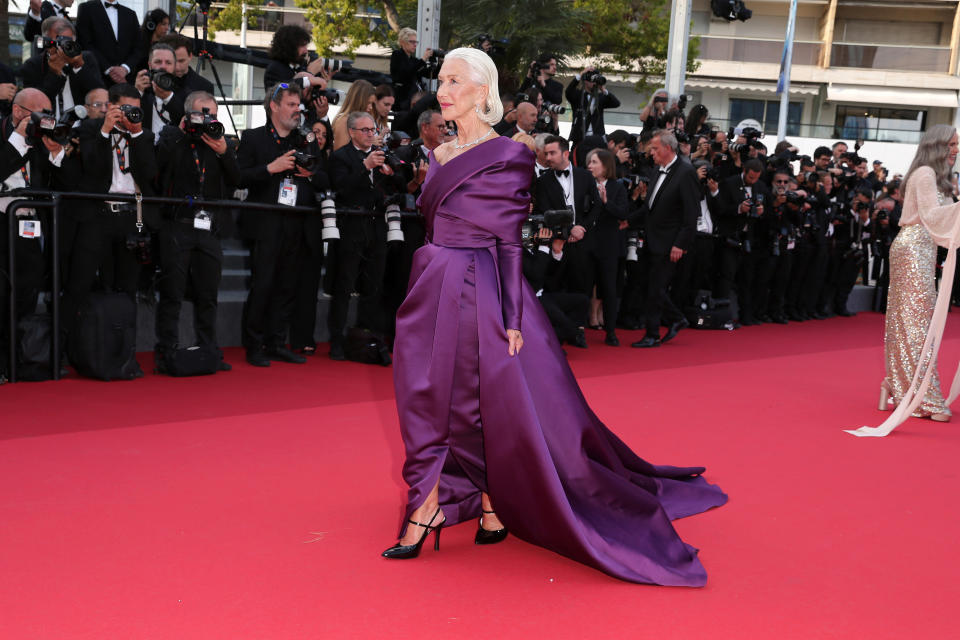 CANNES, FRANCE - MAY 24: Dame Helen Mirren attends the "La Plus Precieuse Des Marchandises" (The Most Precious Of Cargoes) Red Carpet at the 77th annual Cannes Film Festival at Palais des Festivals on May 24, 2024 in Cannes, France in black patent leather heel shoes.