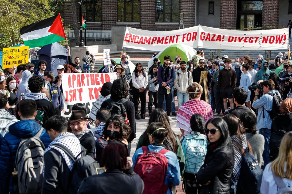 University of Michigan students chant "Occupation No More" and "Israel Is a Terrorist State" as they rally during the encampment for Gaza at the Diag in Ann Arbor on Monday, April 22, 2024.