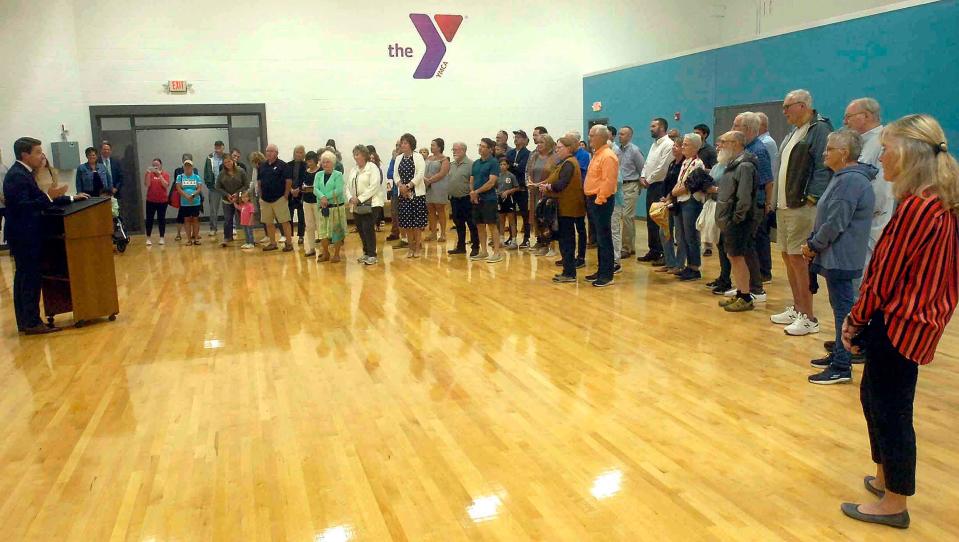 Mayor Matt Miller addresses the crowd at the YMCA grand re-opening ceremony Thursday in Ashland. The $4.1 million, three-phase project "has truly taken it to the next level," he said.