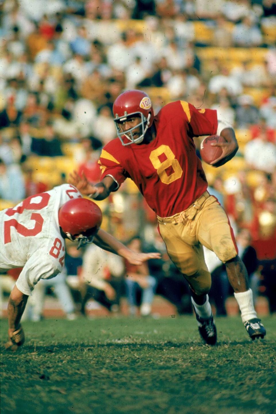 USC quarterback Jimmy Jones runs upfield against Washington State on Nov. 8, 1969, at the Coliseum.