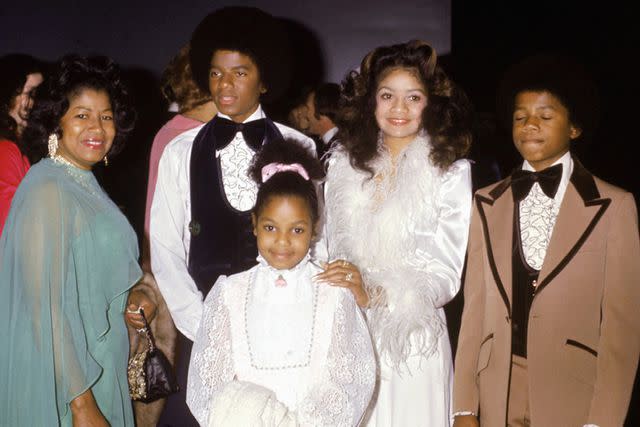 <p>Michael Ochs Archives/Getty</p> Janet Jackson (center) with mother Katherine, Michael, LaToya and Randy Jackson in 1973