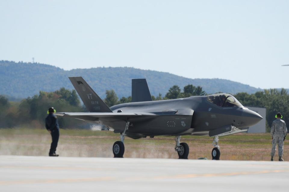 One of the first two F-35 fighter jets arrives at Burlington International Airport on Thursday.