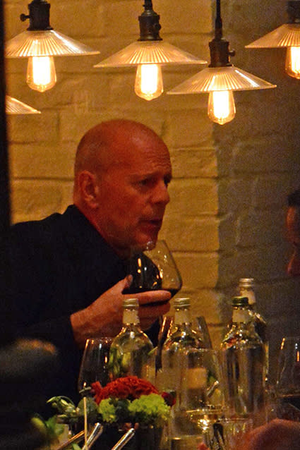Bruce Willis is a generous tipper, to say the least. The <em>Die Hard</em> actor made a German waitress' night in Berlin on Saturday, when he left her a whipping $923 tip following a lavish dinner. Bruce and his wife, Emma Heming-Willis, were out to dinner with model Karolina Kurkova and 13 business partners at Hotel Zoo's Grace restaurant, after which he left the eye-popping tip. According to German newspaper <em>Bild</em>, the group feasted on codfish, lobster, filet mignon and pasta, and indulged in fine wines, Moscow mule cocktails and tequila until the early hours of Sunday morning. VIDEO: Bruce Willis & Demi Moore Pose for Rare Family Photo With Their Daughters WENN The lucky waitress also reportedly spread the wealth -- she allegedly spent the cash partying with colleagues after her shift. The 60-year-old actor was on vacation with his wife, and left the German capital on Sunday. VIDEO: Charlie Sheen Sends Waiter $1000 After NFL Player Tips 20 Cents Last month, Bruce showed his adorable side at dinner with his three eldest daughters Rumer, Scout and Tallulah. Watch below!