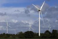 ECO 110 wind turbines manufactured by Alstom are seen in the Landes de Couesme wind farm near La Gacilly, western France, April 26, 2014. REUTERS/Stephane Mahe