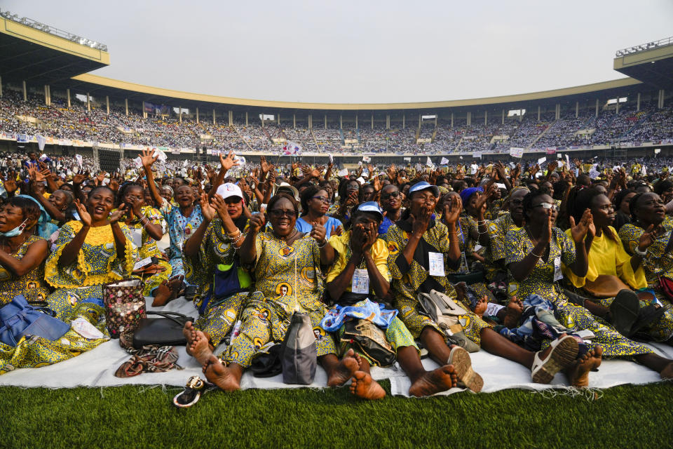 Faithful crowd the Martyrs' Stadium in Kinshasa, Democratic Republic of Congo for a meeting between Francis and young people, Thursday, Feb. 2, 2023. Francis is in Congo and South Sudan for a six-day trip, hoping to bring comfort and encouragement to two countries that have been riven by poverty, conflicts and what he calls a "colonialist mentality" that has exploited Africa for centuries. (AP Photo/Gregorio Borgia)