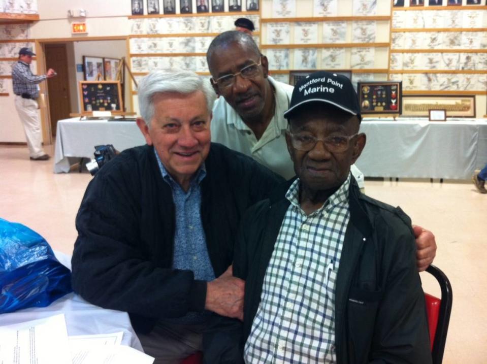 Gulfport Mayor George Schloegel, left, Albert Potts and his father, David Potts, one of the few surviving Montford Point Marines, enjoyed a pancake breakfast at an Honor Flight orientation Saturday in preparation for the April 23, 2013 flight.