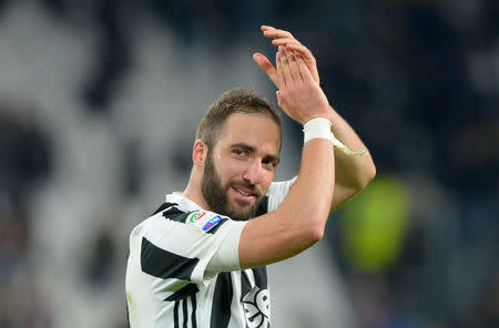 Soccer Football - Serie A - Juventus vs Atalanta - Allianz Stadium, Turin, Italy - March 14, 2018 Juventus’ Gonzalo Higuain applauds fans after the match REUTERS/Massimo Pinca