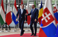 European Council President Charles Michel, right, welcomes Slovakia's Prime Minister Igor Matovic prior to a meeting at the European Council building in Brussels, Thursday, July 16, 2020. (John Thys, Pool Photo via AP)