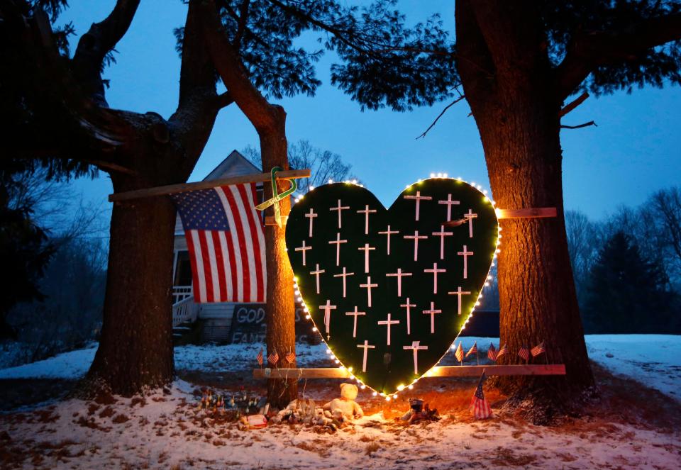 A makeshift memorial with crosses for the victims of the Sandy Hook Elementary School shooting massacre.