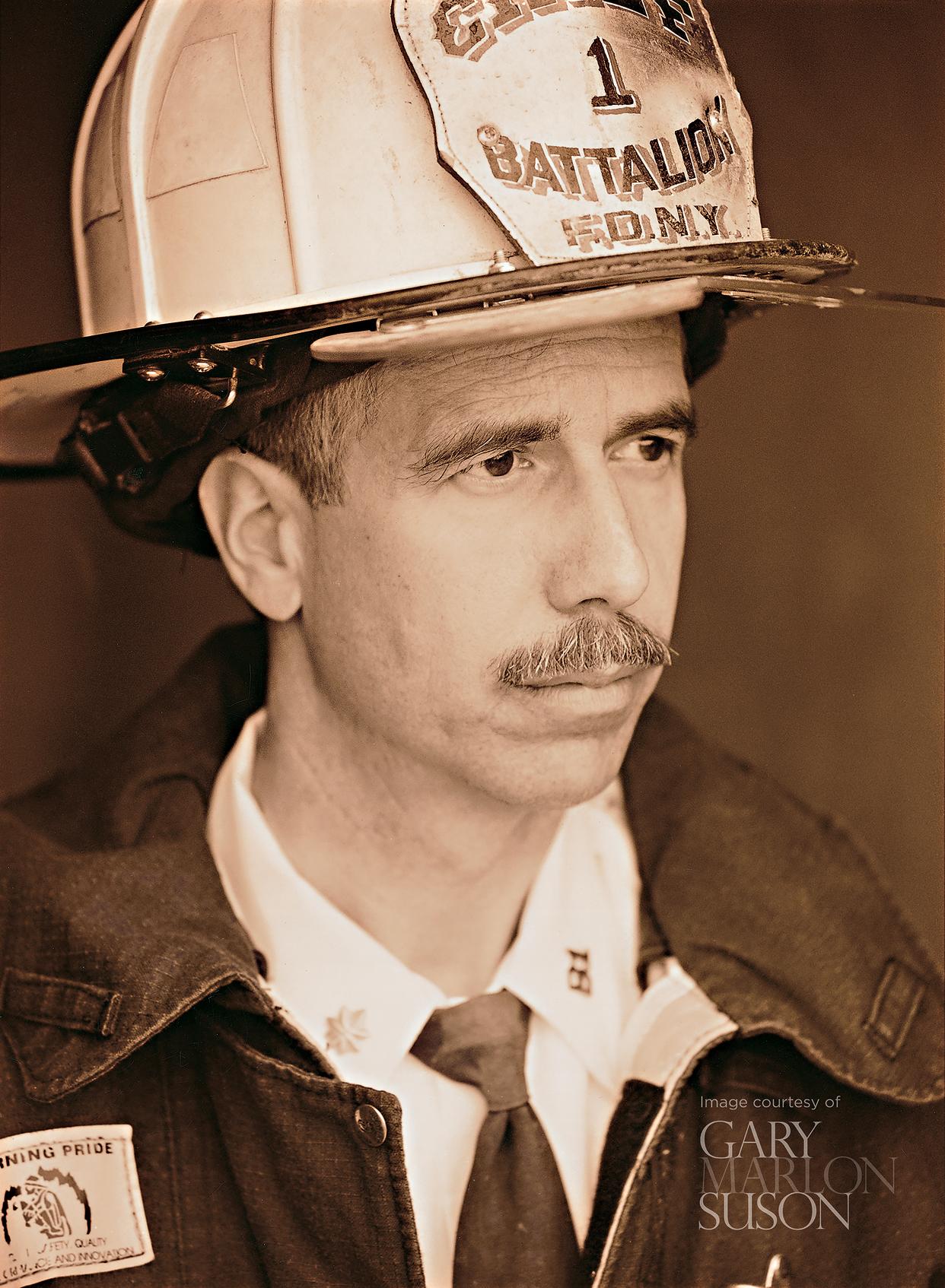 Official ground zero photographer Gary Marlon Suson took this photo of Chief Pfeifer in 2002. Pfeifer wore the same tie he had on the morning of 9/11. (Gary Marlon Suson)