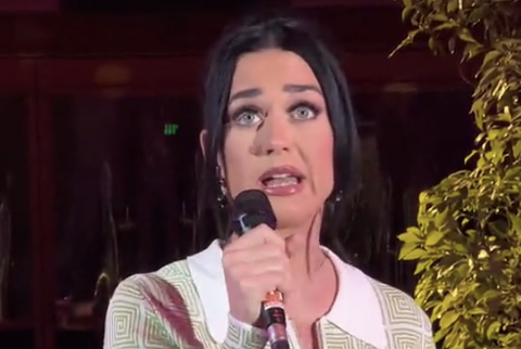 closeup of katy talking into a mic