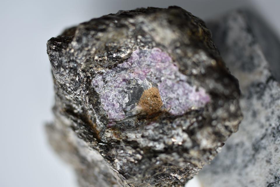 The ruby the team of researchers examined, with traces of graphite in it.
