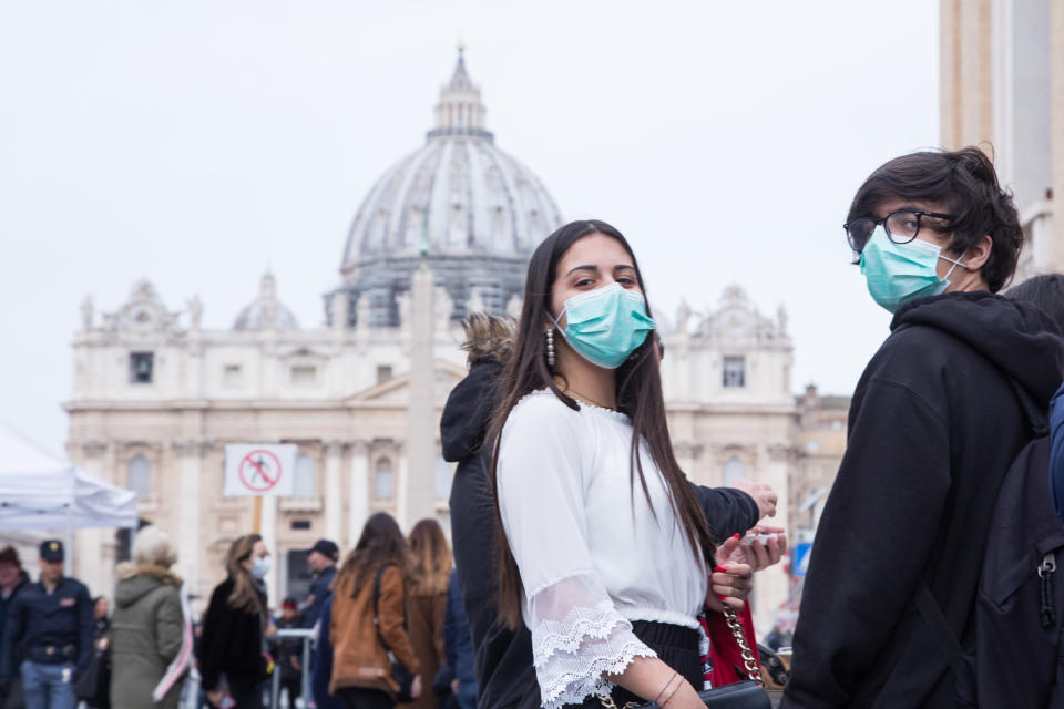 People wear antivirus masks to protect themselves from Coronavirus infection in Rome in St. Peter's Square and along Via della Conciliazione, the day of the beginning of Lent (Photo by Matteo Nardone/Pacific Press/Sipa USA)