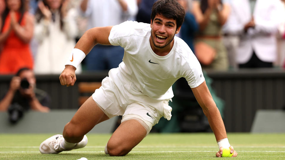 Carlos Alcaraz celebrates after winning the 2023 Wimbledon men's title.