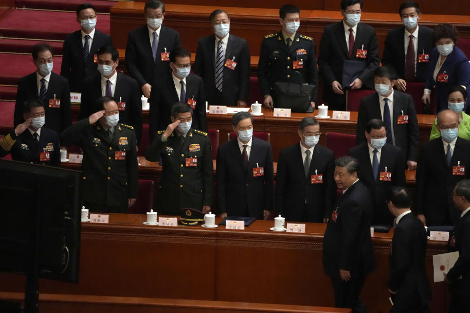 Chinese President Xi Jinping leaves after a session of China's National People's Congress (NPC) at the Great Hall of the People in Beijing, Saturday, March 11, 2023. (AP Photo/Andy Wong)