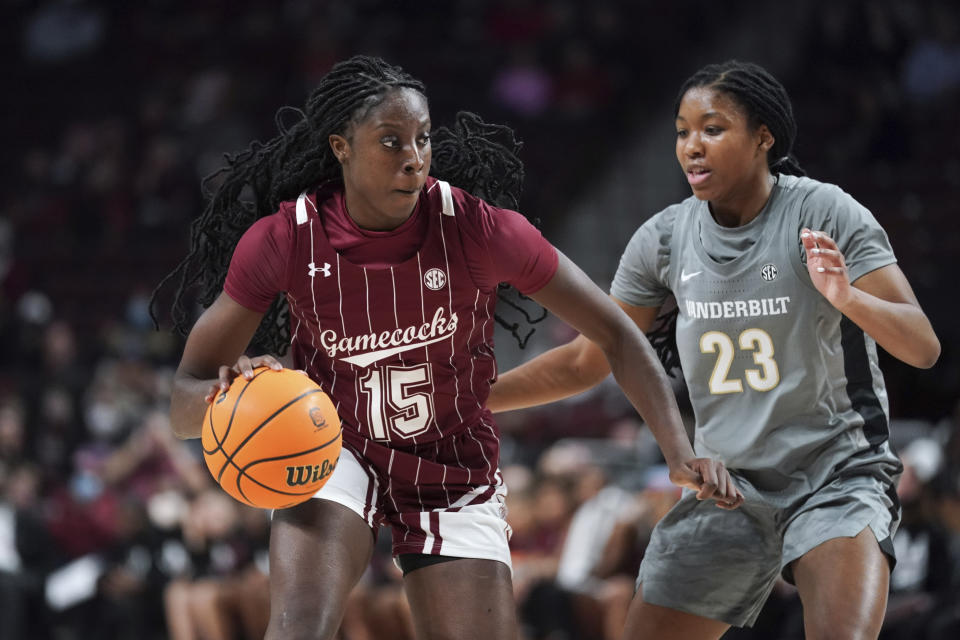 South Carolina forward Laeticia Amihere (15) dribbles against Vanderbilt guard Iyana Moore (23) during the first half of an NCAA college basketball game Monday, Jan. 24, 2022, in Columbia, S.C. (AP Photo/Sean Rayford)