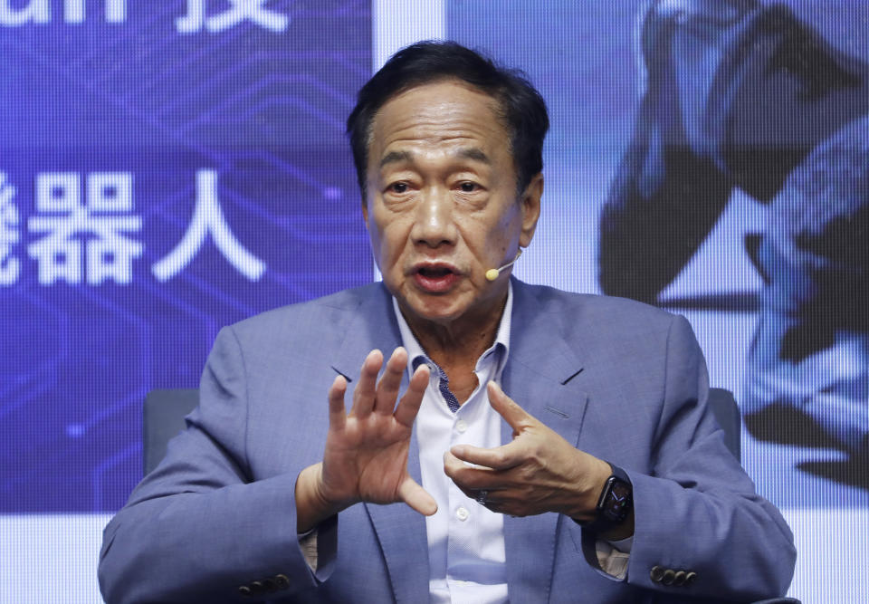 FILE - Chief Executive Officer of Hon Hai Precision Industry (Foxconn) Terry Gou delivers a speech during a media event in Taipei, Taiwan, Sunday, April 30, 2023. Beijing's threats to use force to claim self-governed Taiwan aren't just about missiles and warships. Hard economic realities will be at play as voters head to the polls on Saturday, though the relationship is complicated. (AP Photo/ Chiang Ying-ying, Fie)