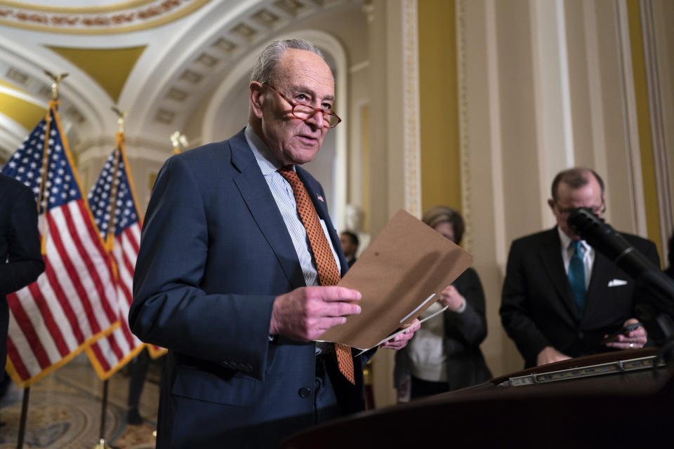 FILE - Senate Majority Leader Chuck Schumer, D-N.Y., arrives to speak with reporters at the Capitol in Washington, May 3, 2023. Schumer has made the emerging technology a priority, arguing that the United States needs to stay ahead of China and other countries that are eyeing regulations on AI products. He has been working with AI experts and has released a general framework of what regulation could look like, including increased disclosure of the people and data involved in developing the technology, more transparency and explanation for how the bots arrive at responses.(AP Photo/J. Scott Applewhite, File)