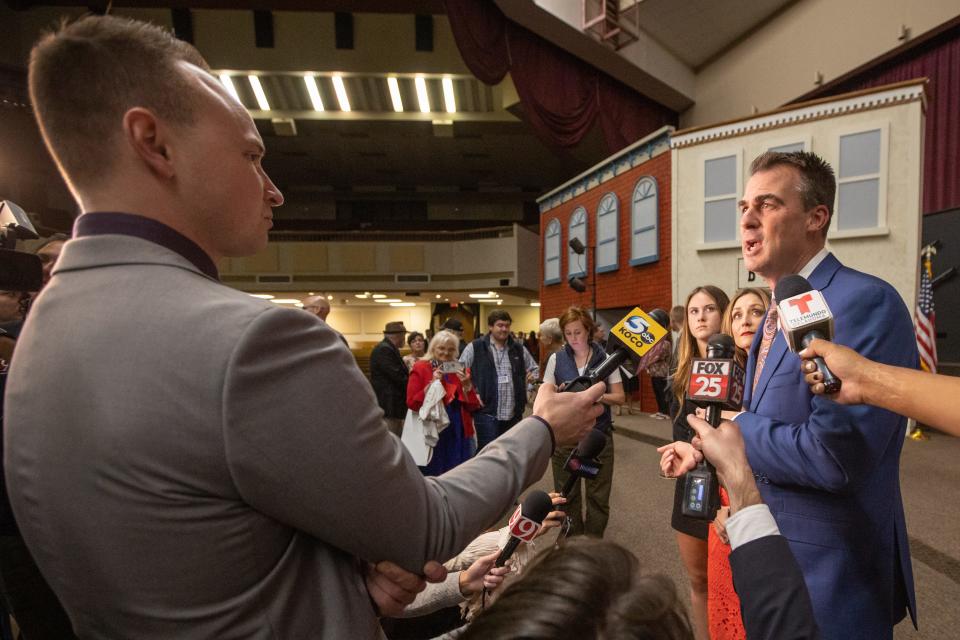 Oklahoma Governor Kevin Stitt speaks to local media on Tuesday at a rally at Crossroads Church in Oklahoma City.
