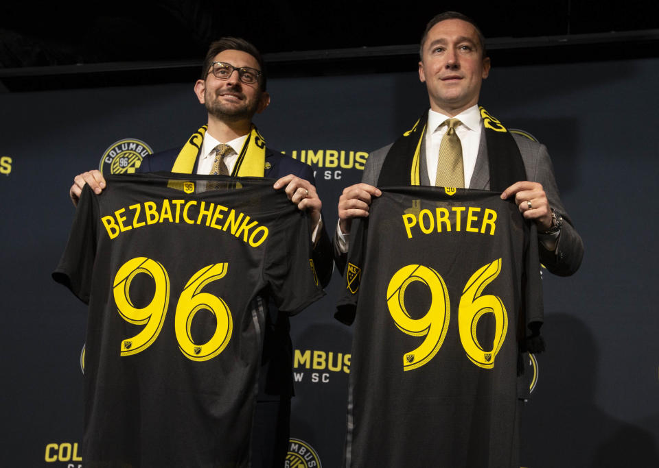 Jan 9, 2019; Columbus, OH, USA; New Columbus Crew SC general manager Tim Bezbatchenko and head coach Caleb Porter stand during an introductory press conference at The Ivory Room. Mandatory Credit: Greg Bartram-USA TODAY Sports/Sipa USA