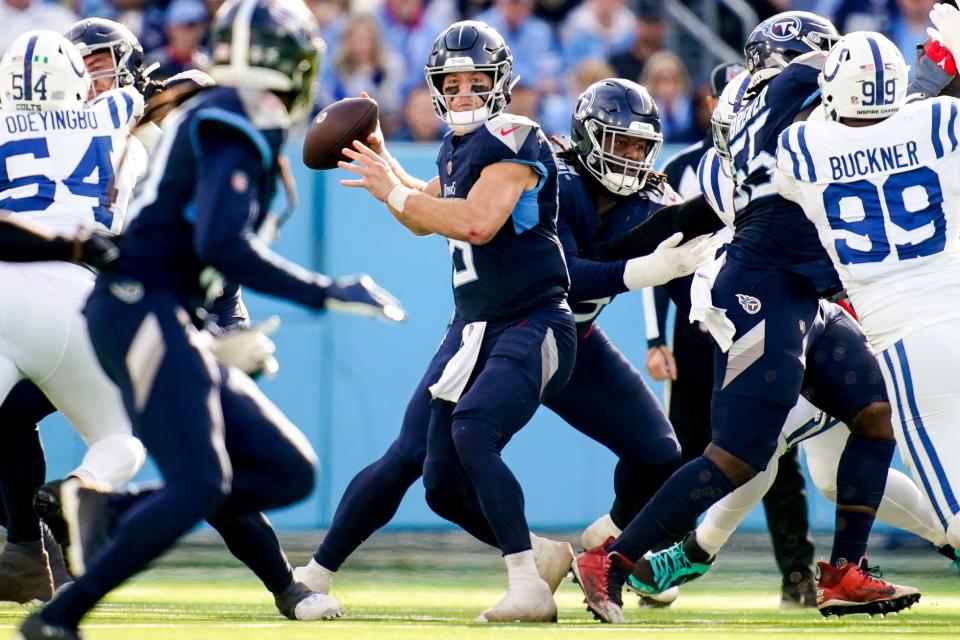 Tennessee Titans quarterback <a class="link " href="https://sports.yahoo.com/nfl/players/40068/" data-i13n="sec:content-canvas;subsec:anchor_text;elm:context_link" data-ylk="slk:Will Levis;sec:content-canvas;subsec:anchor_text;elm:context_link;itc:0">Will Levis</a> (8) looks for a receiver against the Indianapolis Colts during the second quarter at Nissan Stadium in Nashville, Tenn., Sunday, Dec. 3, 2023.