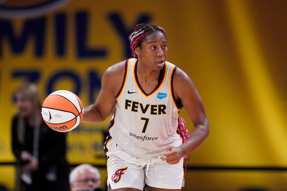 Indiana Fever's Aliyah Boston dribbles during the second half of a WNBA basketball game against the Connecticut Sun, Friday, Aug. 4, 2023, in Indianapolis. (AP Photo/Darron Cummings)