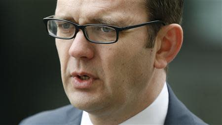 Former Editor of the News of the World Andy Coulson arrives at the Old Bailey courthouse in London March 18 , 2014. REUTERS/Olivia Harris