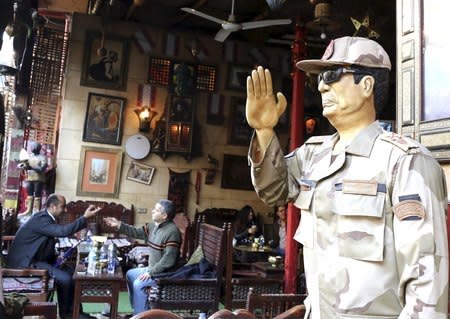 A figure meant to represent Egyptian President Abdel Fattah al-Sisi is seen at a public coffee shop in Islamic Cairo, Egypt, January 17, 2016. REUTERS/Asmaa Waguih