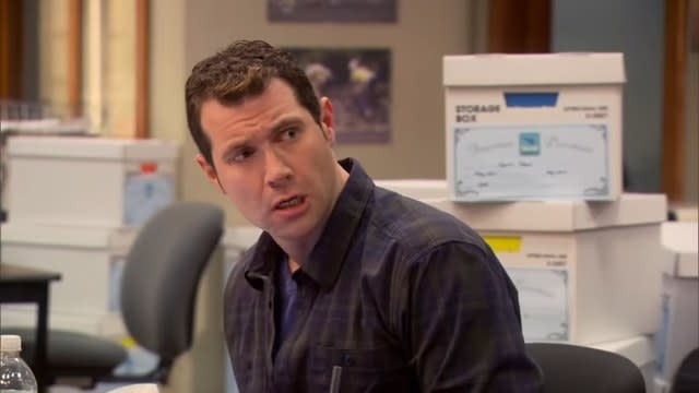 Craig sitting at his desk in "Parks and Recreation"