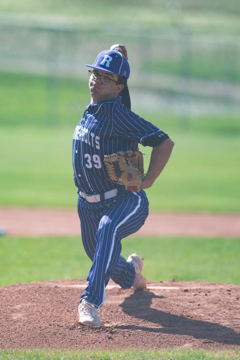 Rye High School's Aydin Swald winds up for a pitch during a game against Monte Vista on Tuesday, April 30, 2024.