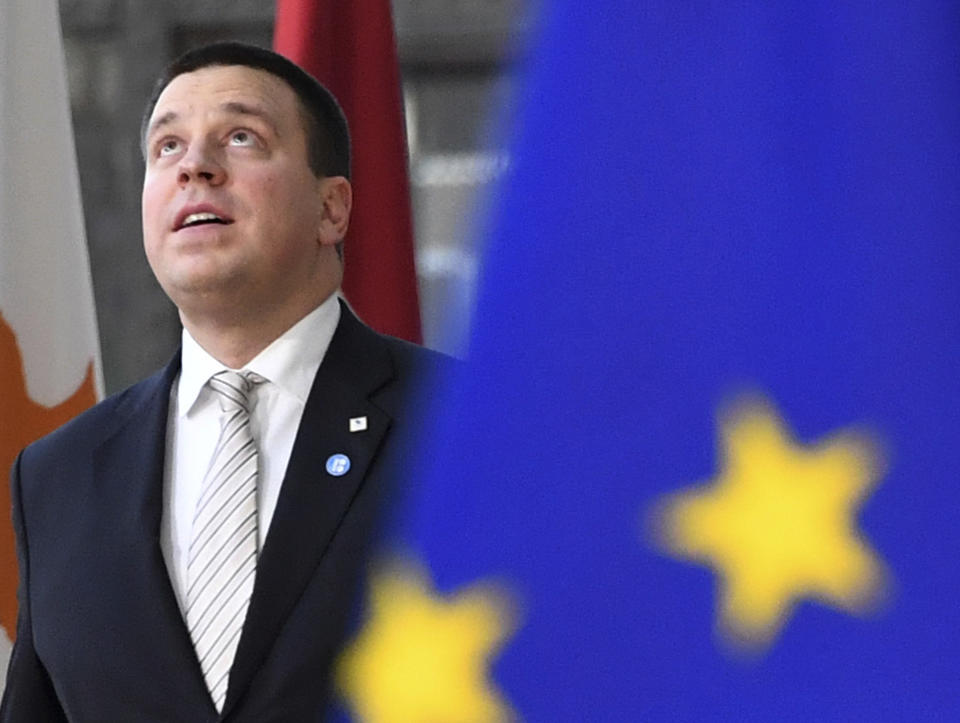 FILE - In this file photo dated Thursday, Dec. 13, 2018, Estonian Prime Minister Juri Ratas arrives for an EU summit in Brussels. The Estonian Conservative People's Party, or EKRE, said Saturday April 6, 2019, it will form a three-way majority government with the centrist Center Party and the conservative Fatherland party, and the Cabinet would be led by Center Party leader, ex-Prime Minister Juri Ratas. (AP Photo/Geert Vanden Wijngaert, FILE)