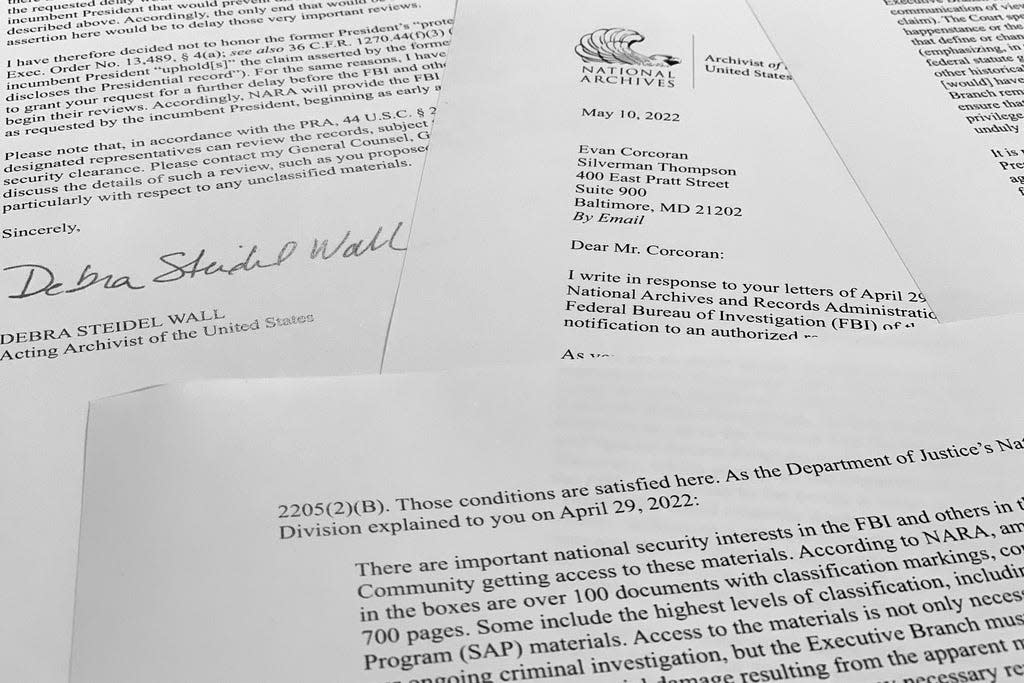 A letter from acting archivist of the United States Debra Steidel Wall to former President Donald Trump's legal team is photographed Tuesday, Aug. 23, 2022. The letter details that the National Archives recovered 100 documents bearing classified markings, totaling more than 700 pages, from an initial batch of 15 boxes retrieved from Mar-a-Lago earlier in 2022.