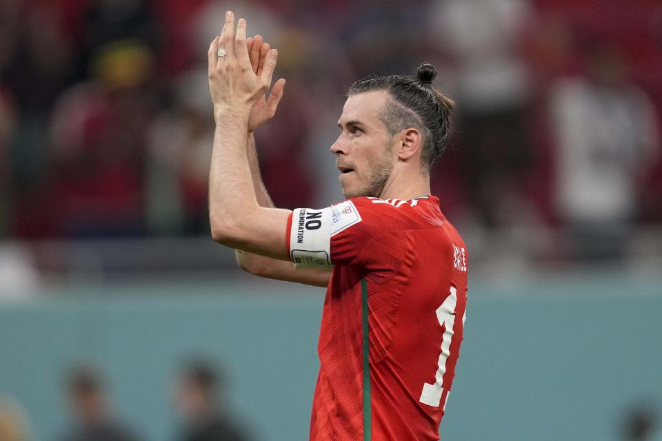 Wales' Gareth Bale reacts during the World Cup, group B soccer match between the United States and Wales, at the Ahmad Bin Ali Stadium in in Doha, Qatar, Tuesday, Nov. 22, 2022. (AP Photo/Darko Vojinovic)