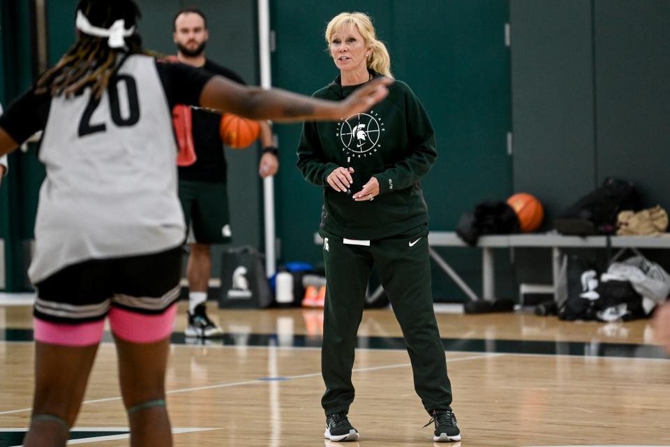 Michigan State's head coach Suzy Merchant talks with players during practice on Wednesday, Sept. 28, 2022, at the Breslin Center in East Lansing.