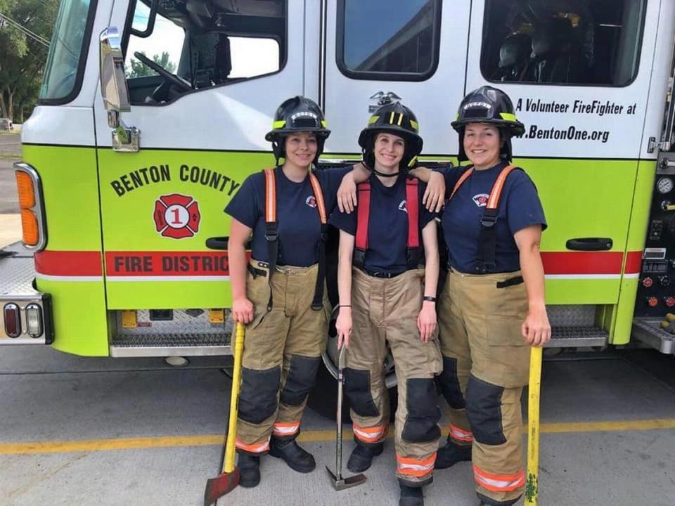 Firefighter/paramedic Samantha Ward, left, shown here in June 2020, is suing Benton County Fire District 1 for discrimination.