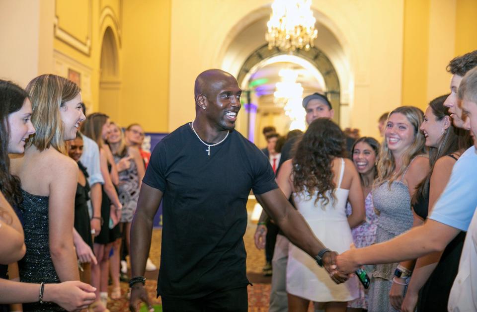Former Patriots star Devin McCourty mingles with the all-stars before Wednesday night's program at the Hanover Theatre.