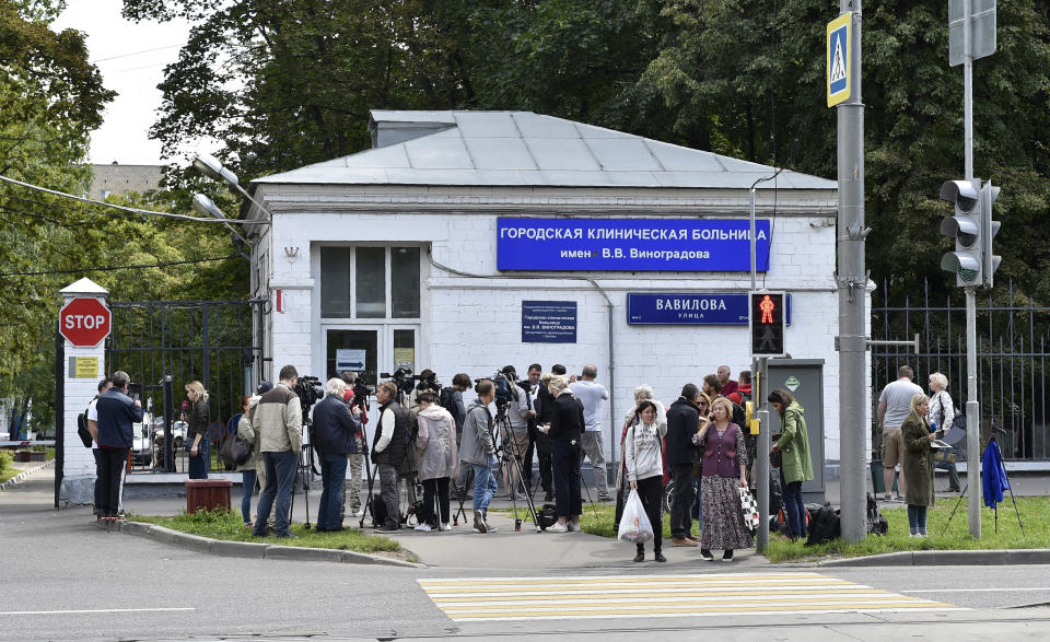 Journalists gather at a hospital where Russian opposition leader Alexei Navalny remained hospitalized, in Moscow, Russia, Monday, July 29, 2019. Navalny remained hospitalized for a second day on Monday after his physician said he may have been poisoned. Details about Navalny's condition were scarce after Navalny was rushed to the hospital Sunday from a detention facility where he was serving a 30-day sentence for calling an unsanctioned protest. (AP Photo)