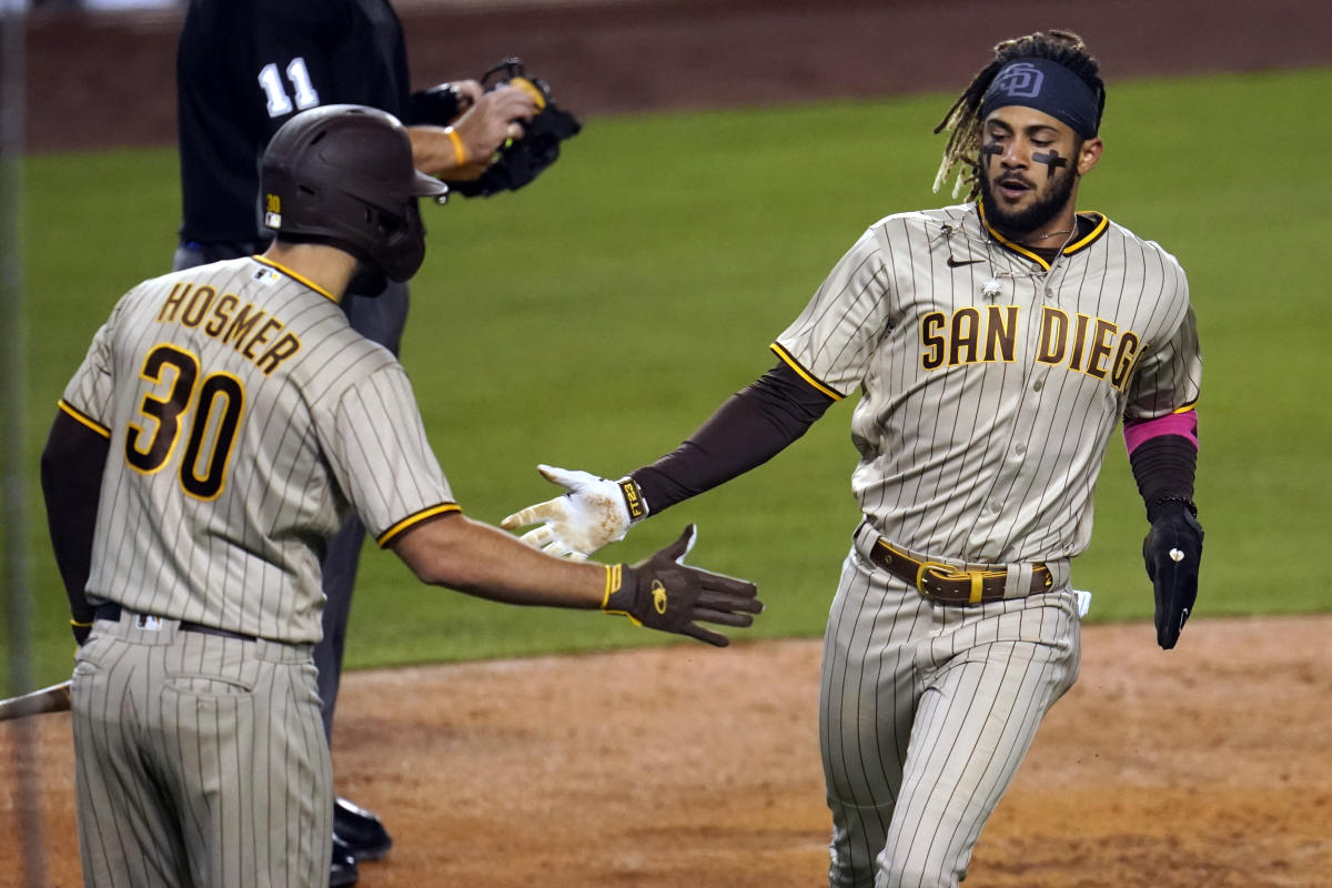 Fernando Tatis Jr. #42 of the San Diego Padres singles against the