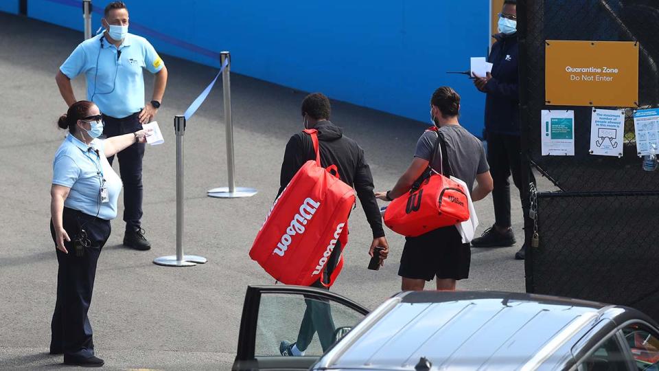 Tennis players, pictured here arriving at Melbourne Park during their five-hour window.