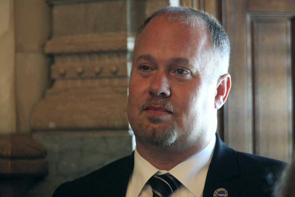 Kansas House Taxation Committee Chair Adam Smith, R-Weskan, watches the debate in the Senate on overriding Democratic Gov. Laura Kelly's veto of a package of tax cuts worth $1.5 billion over three years, Monday, April 29, 2024, at the Statehouse in Topeka, Kan. The effort has failed. (AP Photo/John Hanna)