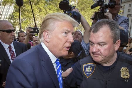 U.S. Republican presidential candidate Donald Trump arrives for jury duty at Manhattan Supreme Court in New York August 17, 2015. REUTERS/Brendan McDermid