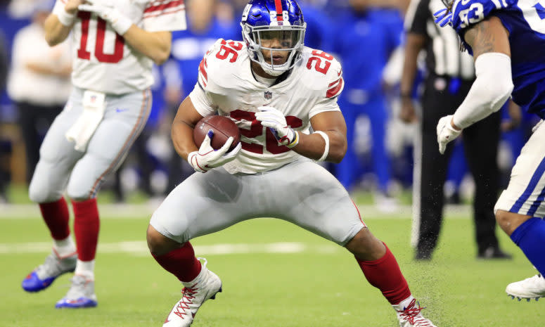 Saquon Barkley running the ball for the New York Giants.