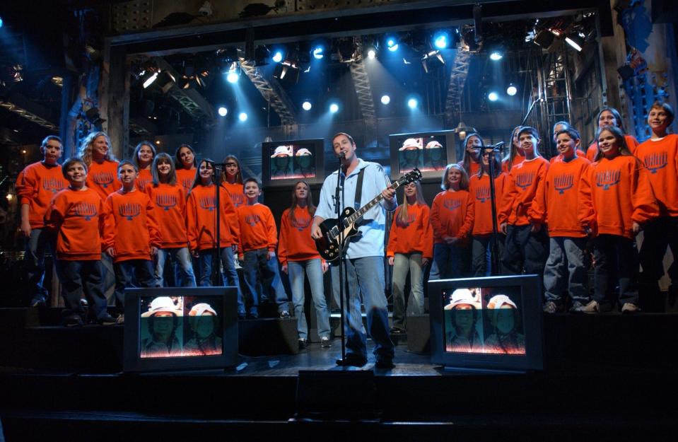 Get ready to play Adam Sandler's "Chanukah Song": The Festival of Lights begins Dec. 22. In this photo Sandler is performing the third version of his holiday tune.