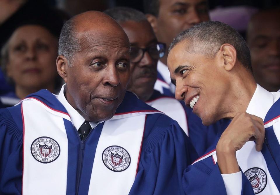 U.S. President Barack Obama (R) with member of Howard University Board of Trustees Vernon Jordan (L) during the 2016 commencement ceremony at Howard University May 7, 2016 in Washington, DC. (Photo by Alex Wong/Getty Images)