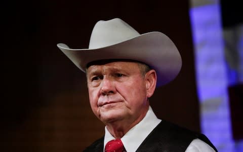 Roy Moore has denied the accusations - Credit: AP