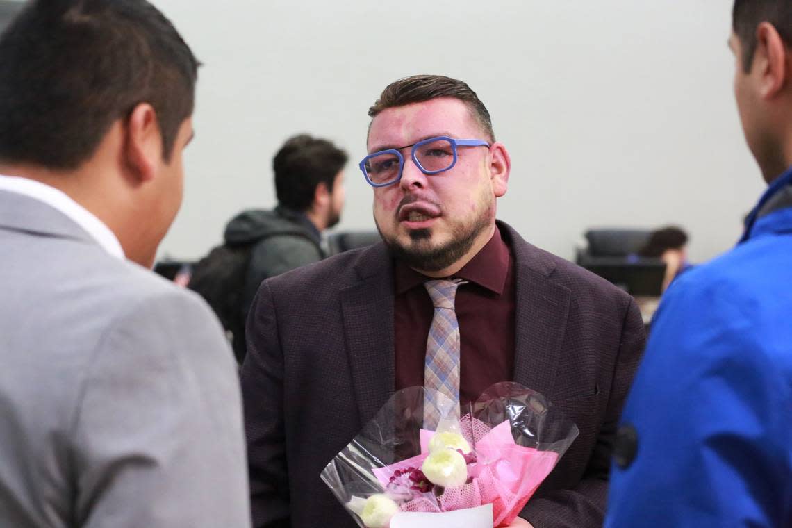 Supervisor Eddie Valero (center) talks to Dr. Randy Villegas, newly elected to the Visalia Unified School District board of trustees representing Area 6 (left) and Visalia’s newly elected city councilmember Emmanuel Hernández Soto (right) after his swear-in ceremony Tuesday morning.