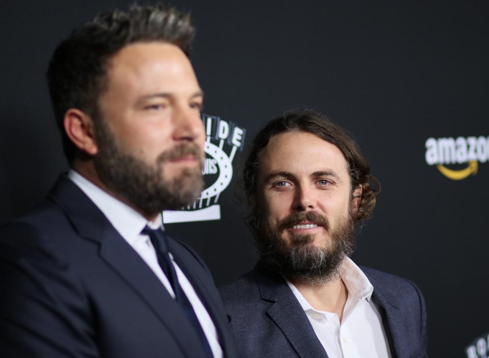 Ben Affleck (left) and Casey Affleck in 2016. "He's doing great," Casey Affleck said of his older brother, who checked into rehab last month. (Photo: JB Lacroix via Getty Images)