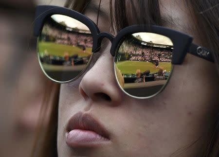 Britain Tennis - Wimbledon - All England Lawn Tennis & Croquet Club, Wimbledon, England - 5/7/16 A reflection in a spectators glasses during USA's Venus Williams against Kazakhstan's Yaroslava Shvedova REUTERS/Tony O'Brien