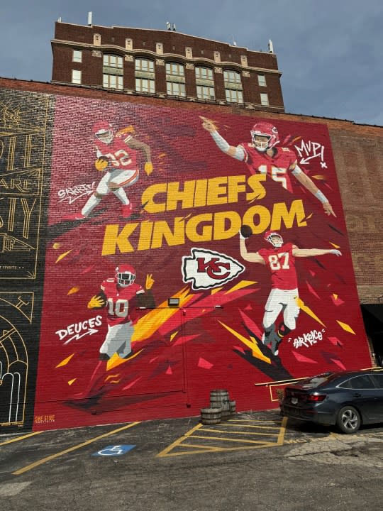 Chiefs Kingdom mural outside Tom's Town at 17th and Main streets in Kansas City. (FOX4 photo)