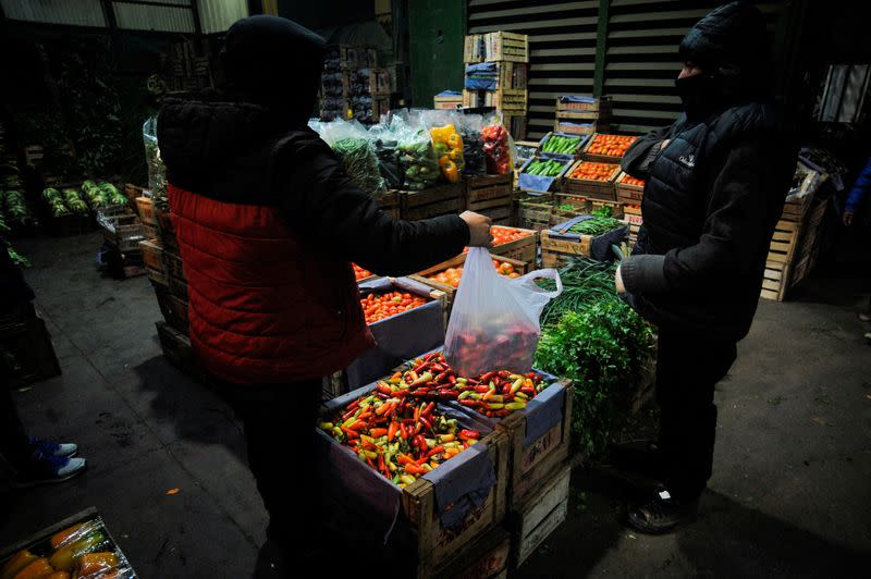 People work at the Mercado Central in Buenos Aires